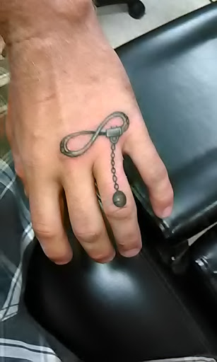 Tattoo Shop «Aasylum Tattoo», reviews and photos, 6604 Seawall Blvd, Galveston, TX 77550, USA