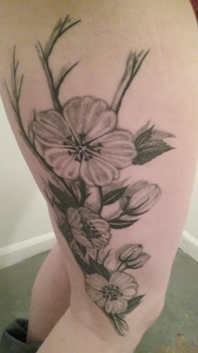 Explore leg sleeve tattoo ideas for women, creative tattoo ideas in Hastings, available at Thirsty Needle Tattoos