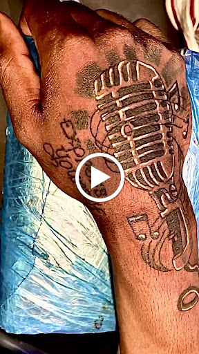 Explore wedding ring tattoo ideas for men, creative tattoo ideas in Redford, available at Prime Tattoo & Beauty