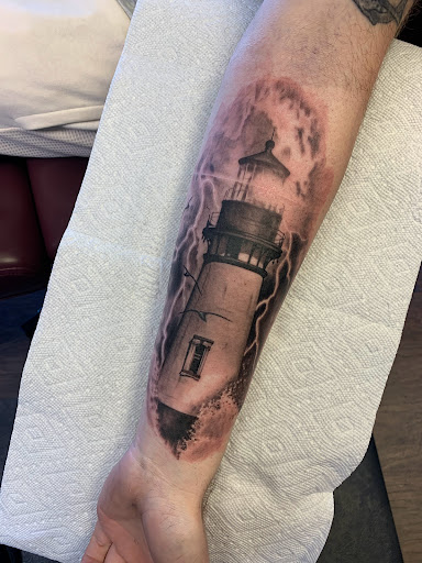 Explore christmas tree tattoo ideas, creative tattoo ideas in Cambridge City, available at Alien Earth Tattoo Studio LLC