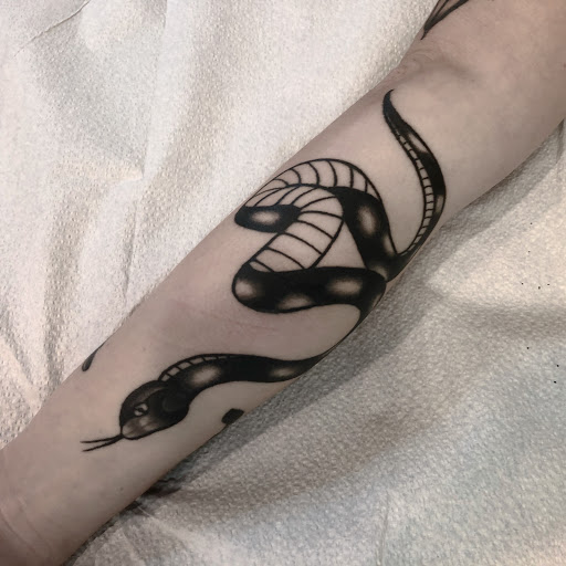 Explore piston tattoo ideas, creative tattoo ideas in San Francisco, available at Two Cranes Tattoo