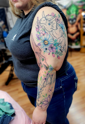 Explore half sleeve forearm tattoo ideas, creative tattoo ideas in Benton, available at Spectrum Tattoo