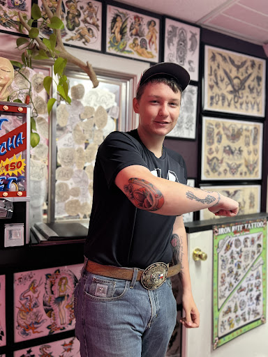 Explore hand tattoo ideas for men, creative tattoo ideas in Georgetown, available at Iron Rite Tattoo South