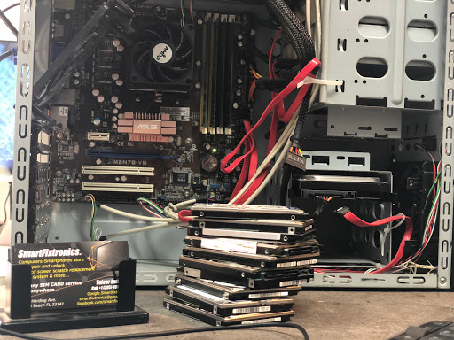 Computer Store «SMARTFIXTRONICS, Computer Phone Repair & SIM card Services.», reviews and photos, 7135 Collins Ave, Miami Beach, FL 33141, USA