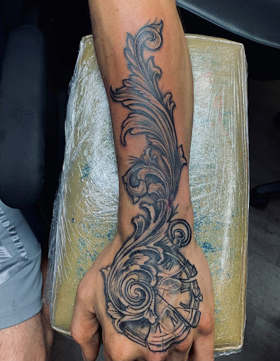 Explore arm sleeve tattoo ideas for men, creative tattoo ideas in Fort Worth, available at Twisted Ink