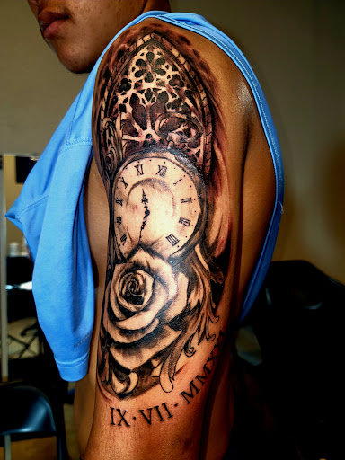 Explore shoulder tattoo ideas, creative tattoo ideas in Onalaska, available at Rock Bottom Tattoo Studio