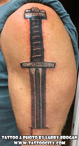 Explore spaceship tattoo ideas, creative tattoo ideas in Lockport, available at Tattoo City by Larry Brogan