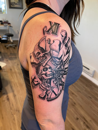 Explore hand cover up tattoo ideas, creative tattoo ideas in Elko, available at Freedom Tattoo