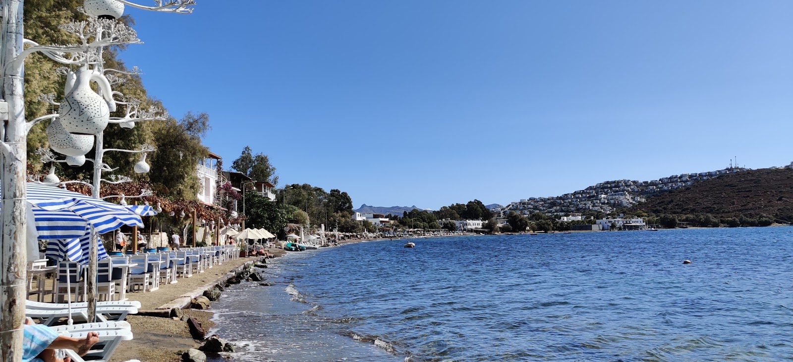 Gumusluk Plajı'in fotoğrafı çakıl ile kum yüzey ile