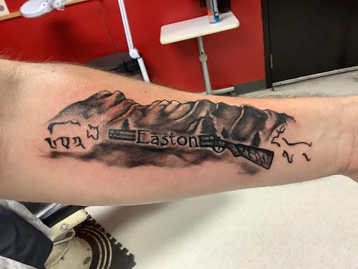 Explore name placement tattoo ideas, creative tattoo ideas in Turner, available at Heathen Ink