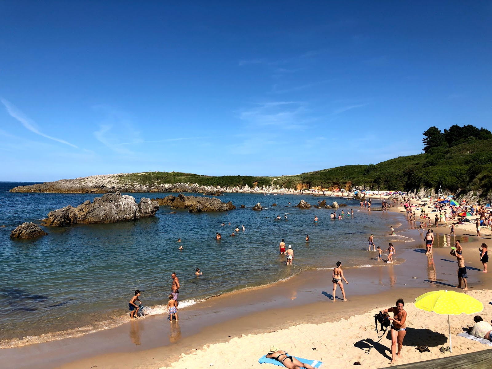 Foto av Playa de Toro med beige sand yta