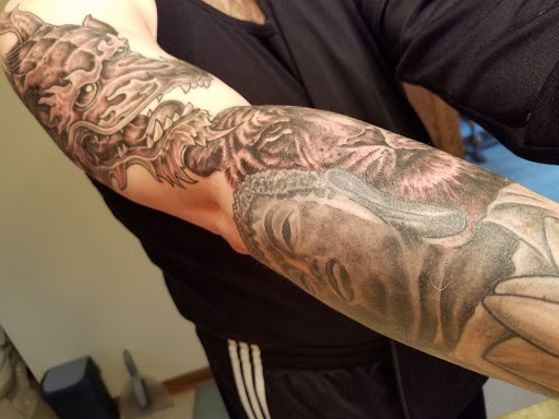 Explore concert tattoo ideas, creative tattoo ideas in Waukesha, available at Waukesha Tattoo Company Galleria Edge