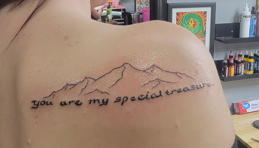 Explore cheek tattoo ideas, creative tattoo ideas in Loveland, available at Satori Tattoo