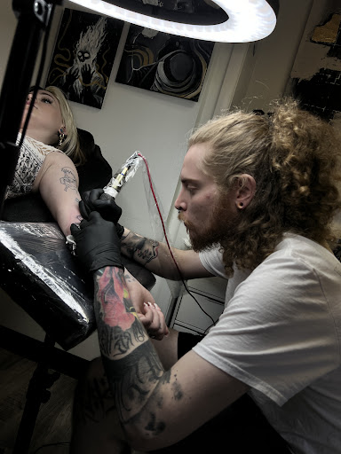 Explore love tattoo ideas, creative tattoo ideas in Milwaukee, available at Beauty is Pain Tattoo and Body Piercings