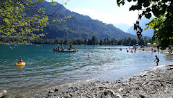 Strandbad Flihorn'in fotoğrafı düz bir kıyı şeridi ile birlikte
