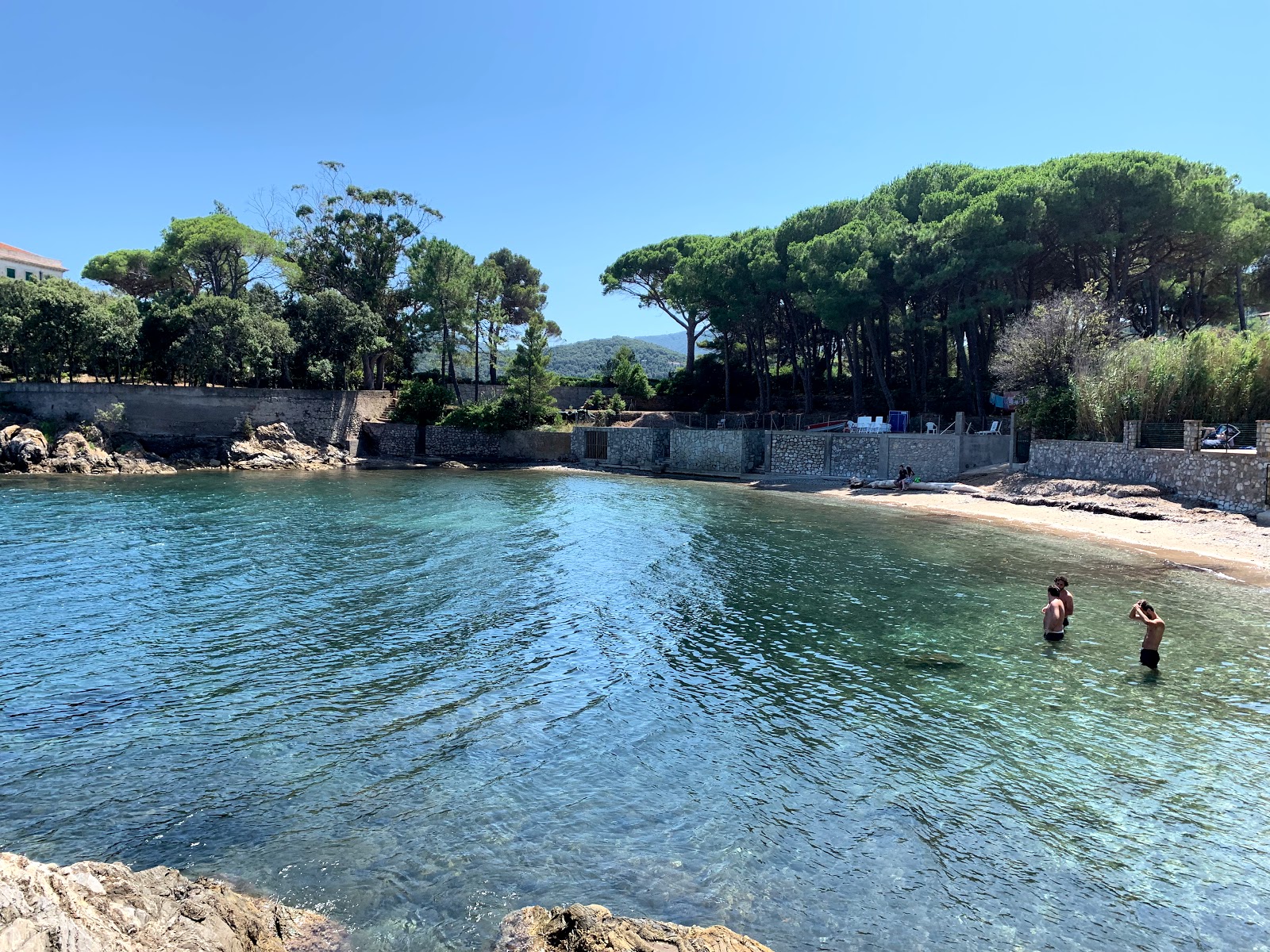 Foto av Cala delle Alghe med lätt fin sten yta