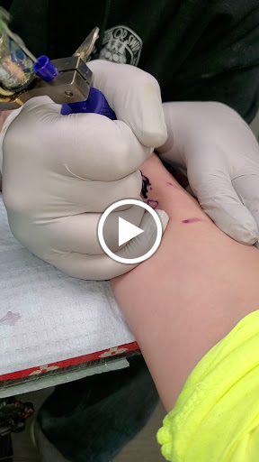 Explore name neck tattoo ideas, creative tattoo ideas in Saint Charles, available at Sink or Swim Tattoo