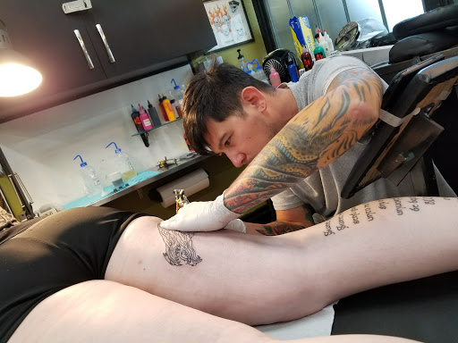 Find tattoos in between breast ideas for your next unique tattoo in Fort Wayne at Cardinal Tattoo & Piercing