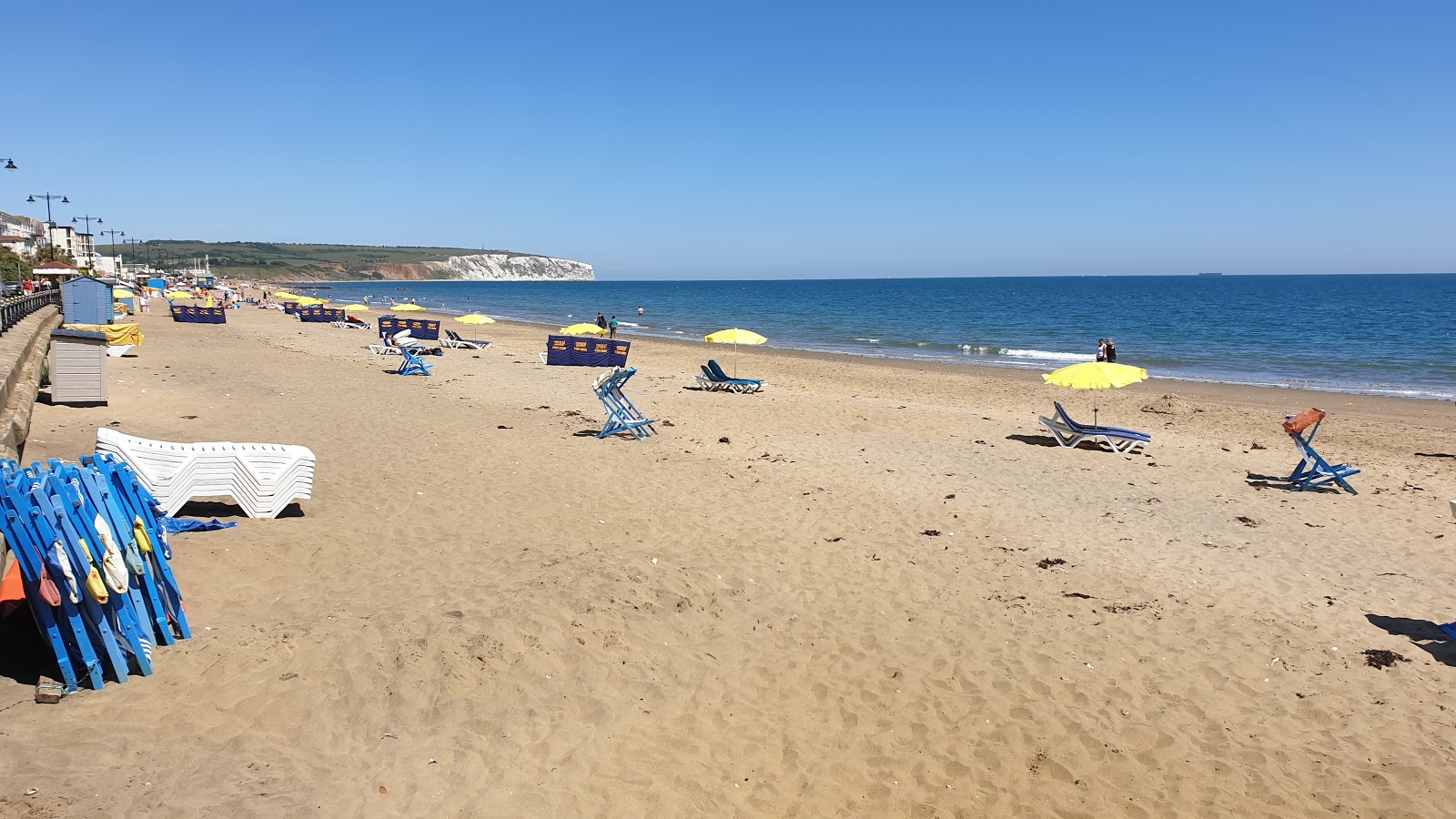 Foto di Spiaggia di Sandown con una superficie del sabbia luminosa