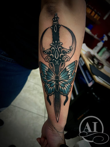 Find angel tattoo ideas for ladies for your next unique tattoo in Katy at Artistic Impressions Tattoo Studio