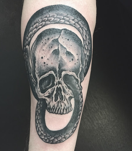 Explore cartoon tattoo ideas for men, creative tattoo ideas in Neptune, available at Neptune Tattooville