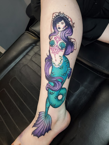 Explore animal sleeve tattoo ideas, creative tattoo ideas in Barberton, available at Magic City Tattoo Company