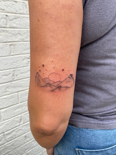 Explore simple thigh tattoo ideas, creative tattoo ideas in Charlotte, available at Electric Ink Tattoo