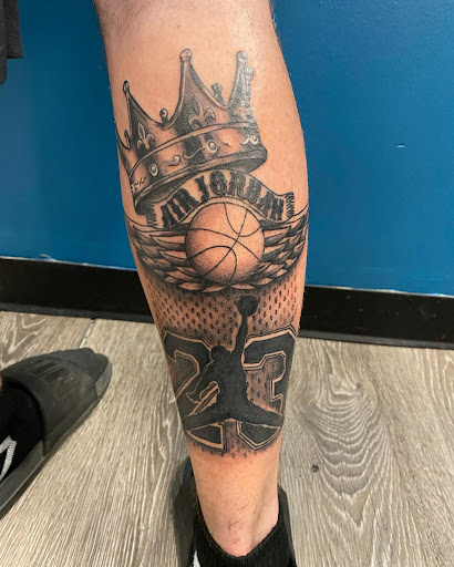 Explore lower back tattoo ideas for men, creative tattoo ideas in Westland, available at Premier Tattoo Company Westland