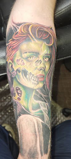 Find time tattoo ideas for your next unique tattoo in Angola at Hoodlum Ink