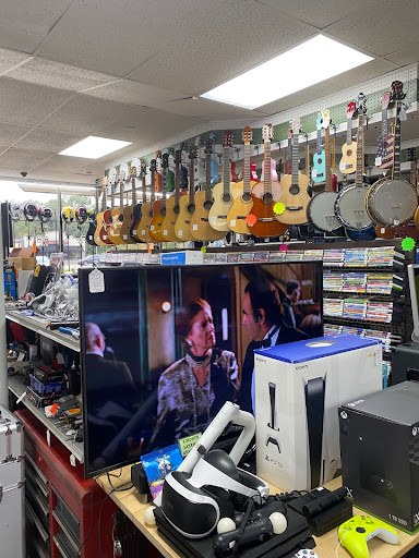 Pawn Shop «Wizebuys PawnBrokers Outlet», reviews and photos, 2928 E Highland Rd, Highland Charter Twp, MI 48356, USA