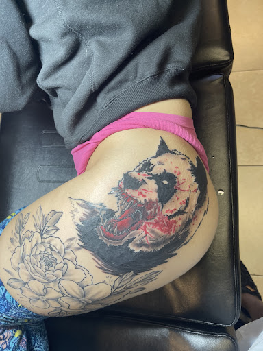 Explore hair stylist tattoo ideas, creative tattoo ideas in Largo, available at Ink Godz Tattoo 2