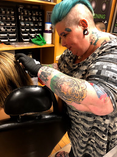 Explore shield tattoo ideas, creative tattoo ideas in Glendale, available at Modern Mods Body Piercings - Arrowhead