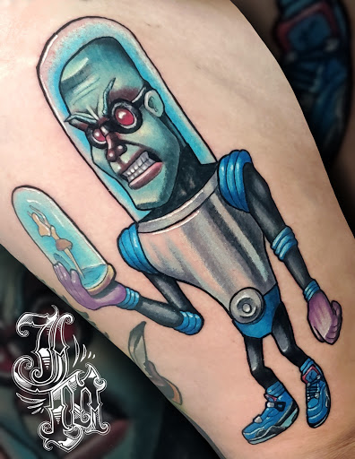 Explore swimming tattoo ideas, creative tattoo ideas in Lombard, available at New Hope Tattoo