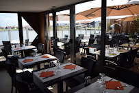 Atmosphère du Restaurant français Restaurant L'Escalumade à Gujan-Mestras - n°1