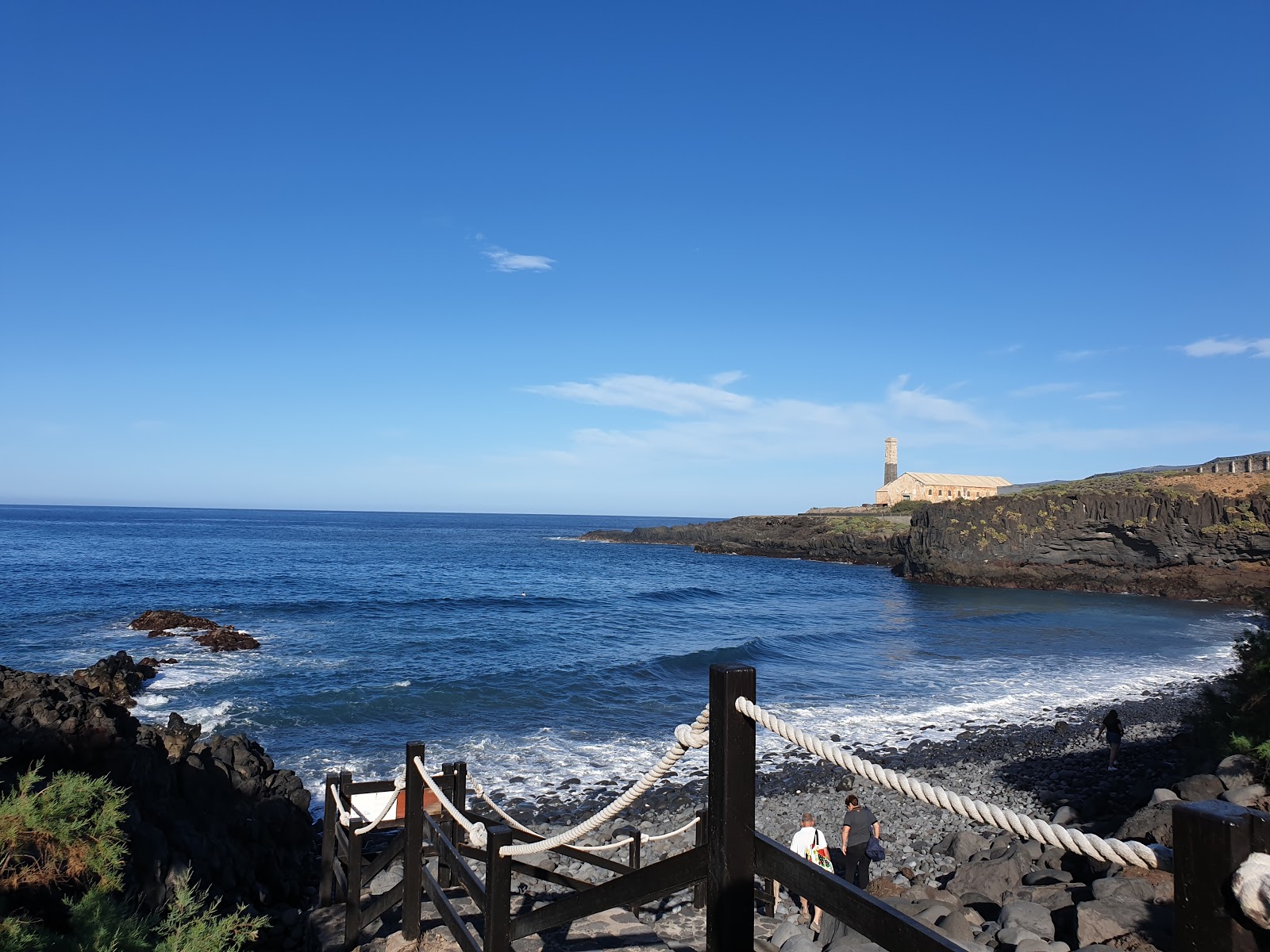 Foto av Playa de Agua Dulce med blå rent vatten yta