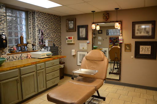 Explore fox racing tattoo ideas, creative tattoo ideas in Rockford, available at Delicious Ink Tattoo & Piercing