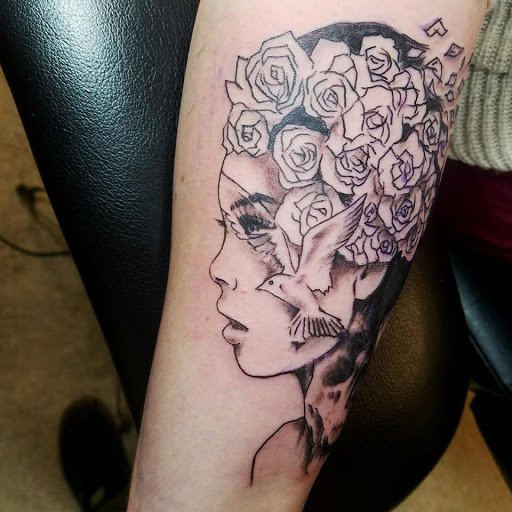 Explore bass fish tattoo ideas, creative tattoo ideas in Flint, available at Black Eye Social Club Tattoo