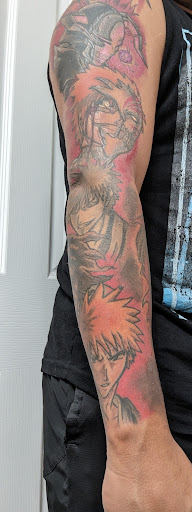 Explore arm sleeve tattoo ideas for men, creative tattoo ideas in Clarksville, available at 2 Dot Crew Tattoo