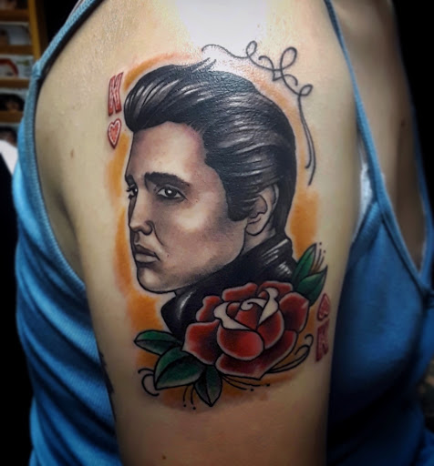 Explore red ink neck tattoo ideas, creative tattoo ideas in North Hollywood, available at The Electric Pen Tattoo Studio