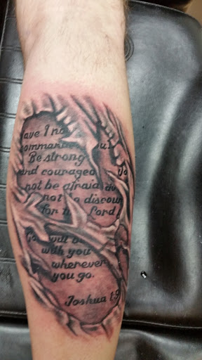 Explore geometric sleeve tattoo ideas, creative tattoo ideas in Sioux Falls, available at Alien & Co.