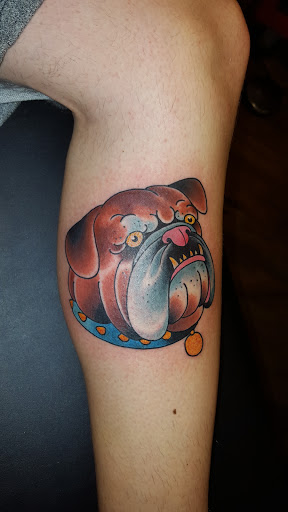 Explore tattoo son ideas, creative tattoo ideas in Providence, available at The Torchbearer Tattoo
