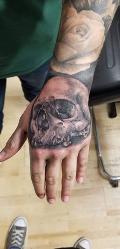 Explore in god we trust tattoo ideas, creative tattoo ideas in Rochester, available at Vicious Ink Tattoos & Piercing