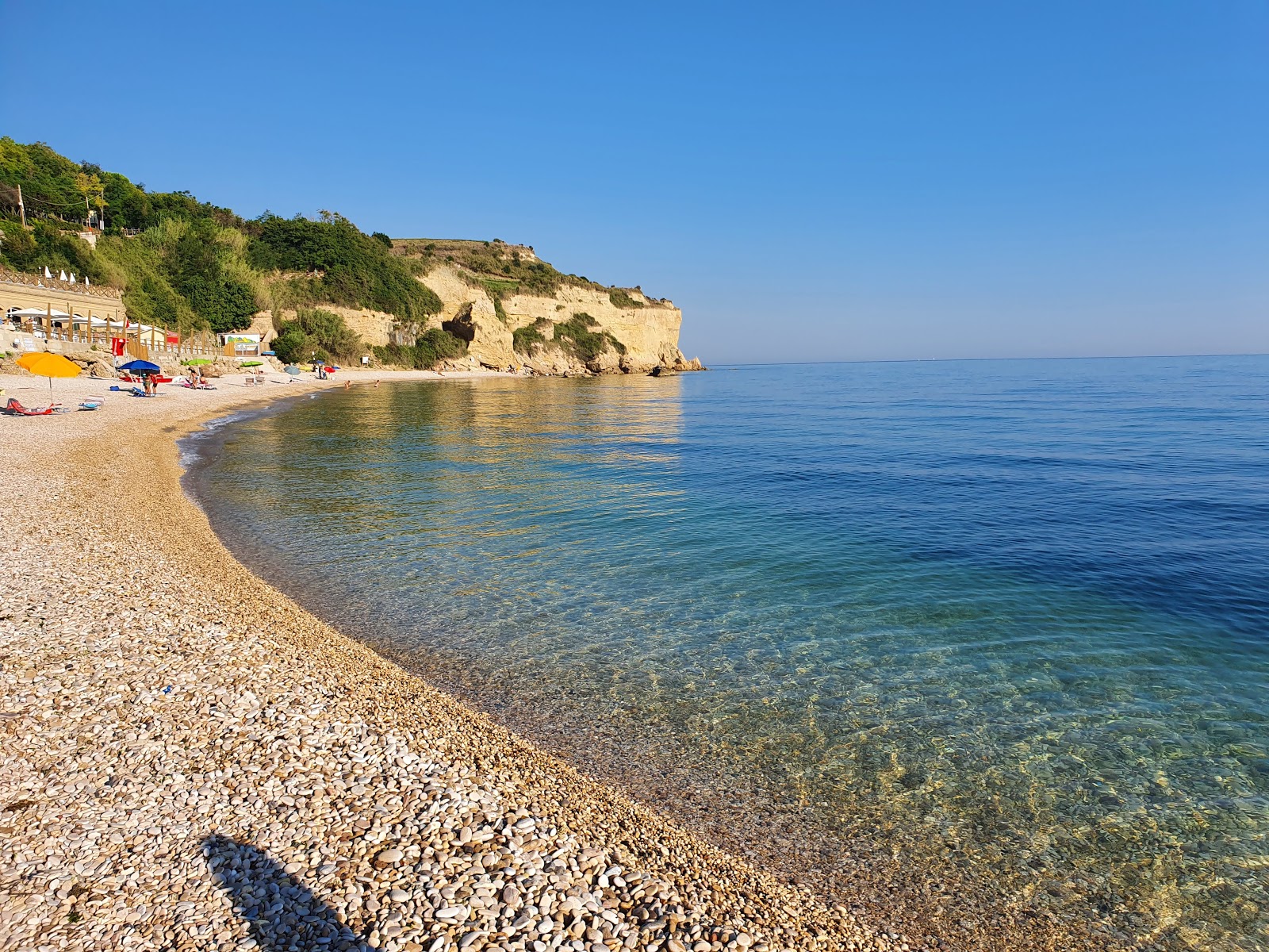 Fotografija Spiaggia dei Ripari di Giobbe z lahki kamenček površino