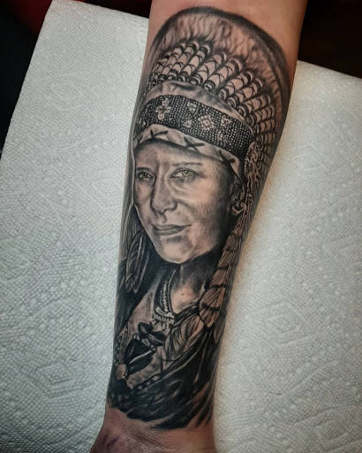 Explore small money tattoo ideas, creative tattoo ideas in Lakeview, available at Backwoods Tattoo Studio