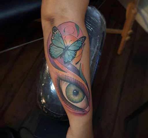 Explore south carolina tattoo ideas, creative tattoo ideas in Dothan, available at Dinosaur Tattoo Company