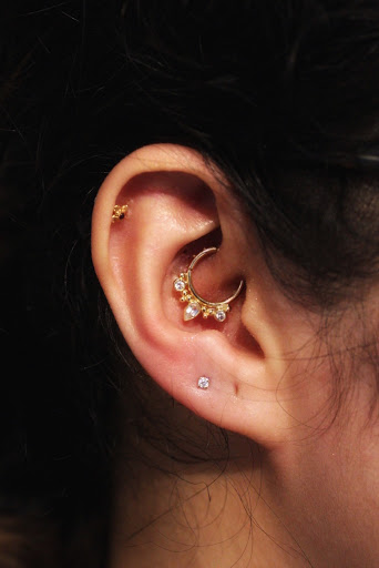 Explore neck tattoo ideas woman, creative tattoo ideas in Brooklyn, available at Ahimsa Piercing Studio & BVLA Fine Jewelry