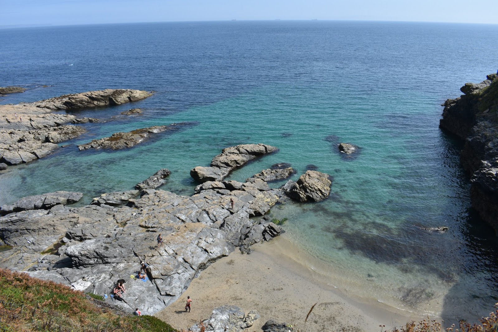 Photo of Piskies Cove with turquoise pure water surface