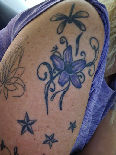 Explore beauty and beast tattoo ideas, creative tattoo ideas in Marble Falls, available at Flashback Tattoo