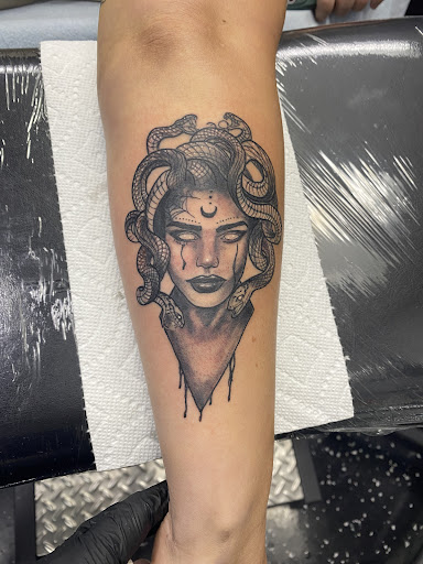 Explore half sleeve cover up tattoo ideas, creative tattoo ideas in Fort Myers, available at Loyal 2 The Coil Tattoos & Piercings (Edison Mall Location Entrance F)