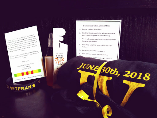 Explore boondocks tattoo ideas, creative tattoo ideas in Bowling Green, available at BroadWing Tattoo and Body Piercing